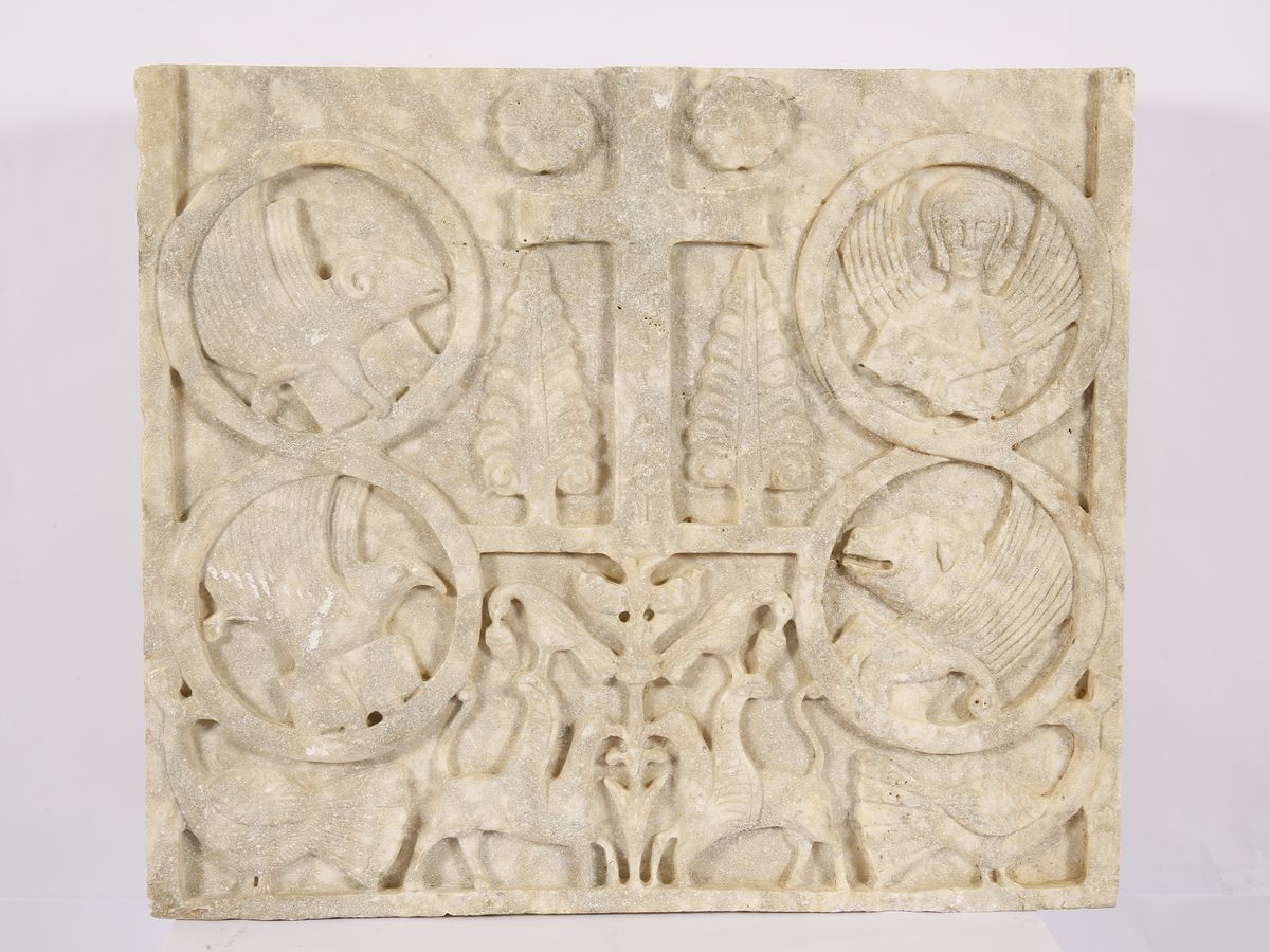 A carved stone relief from the Émile Hannouche Museum.